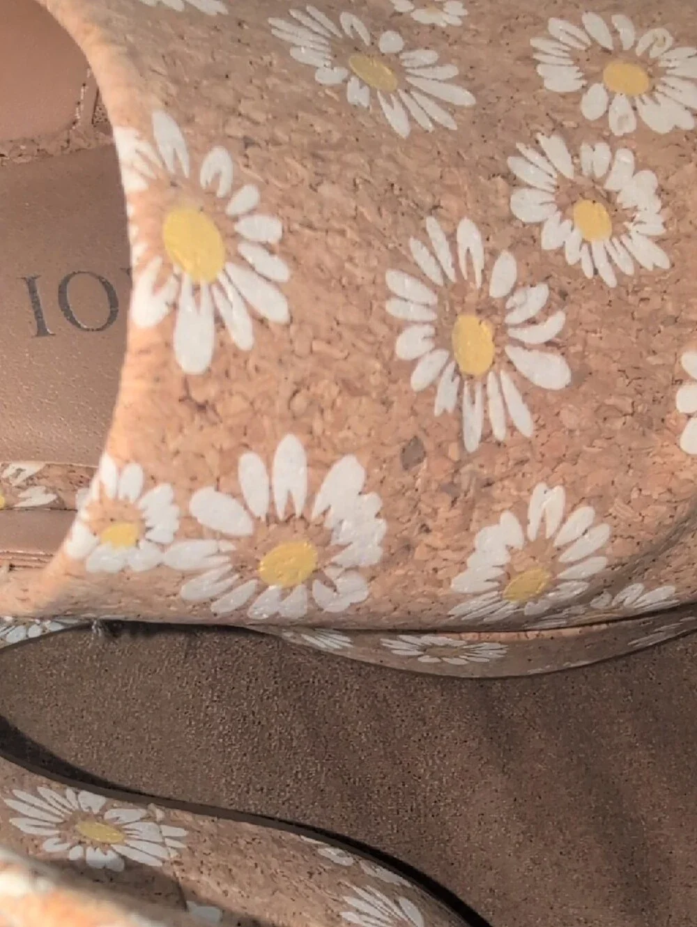 Chelsea & Violet daisy-patterned cork wedge heel.